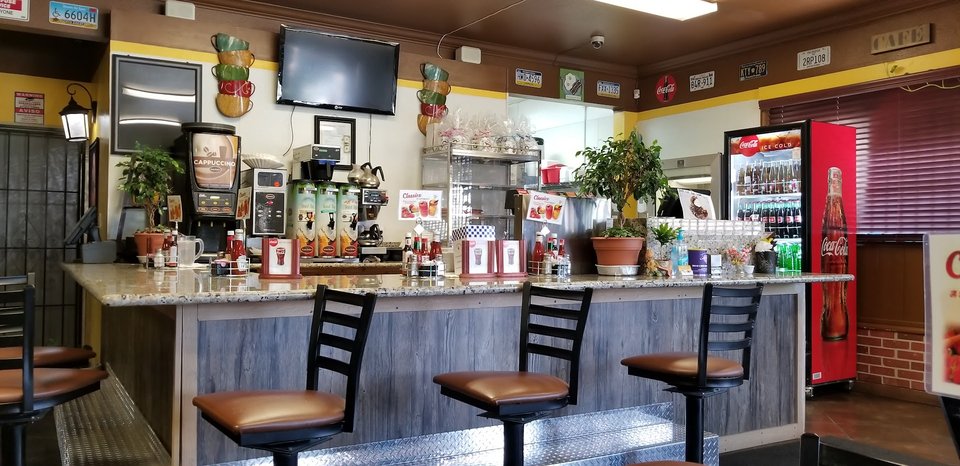 Comfortable restaurant interior with simple table service.