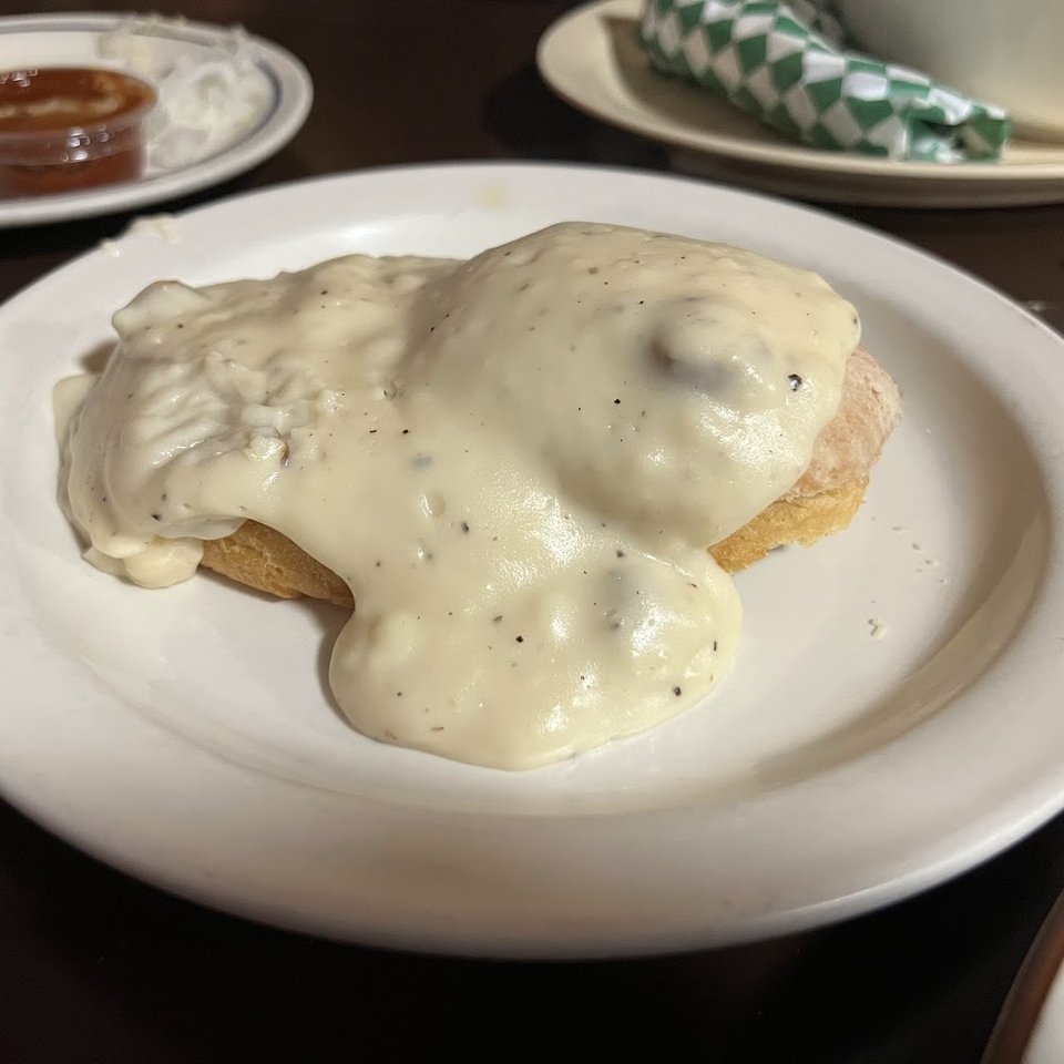 Cafe menu with beverages, desserts, and comfort food.